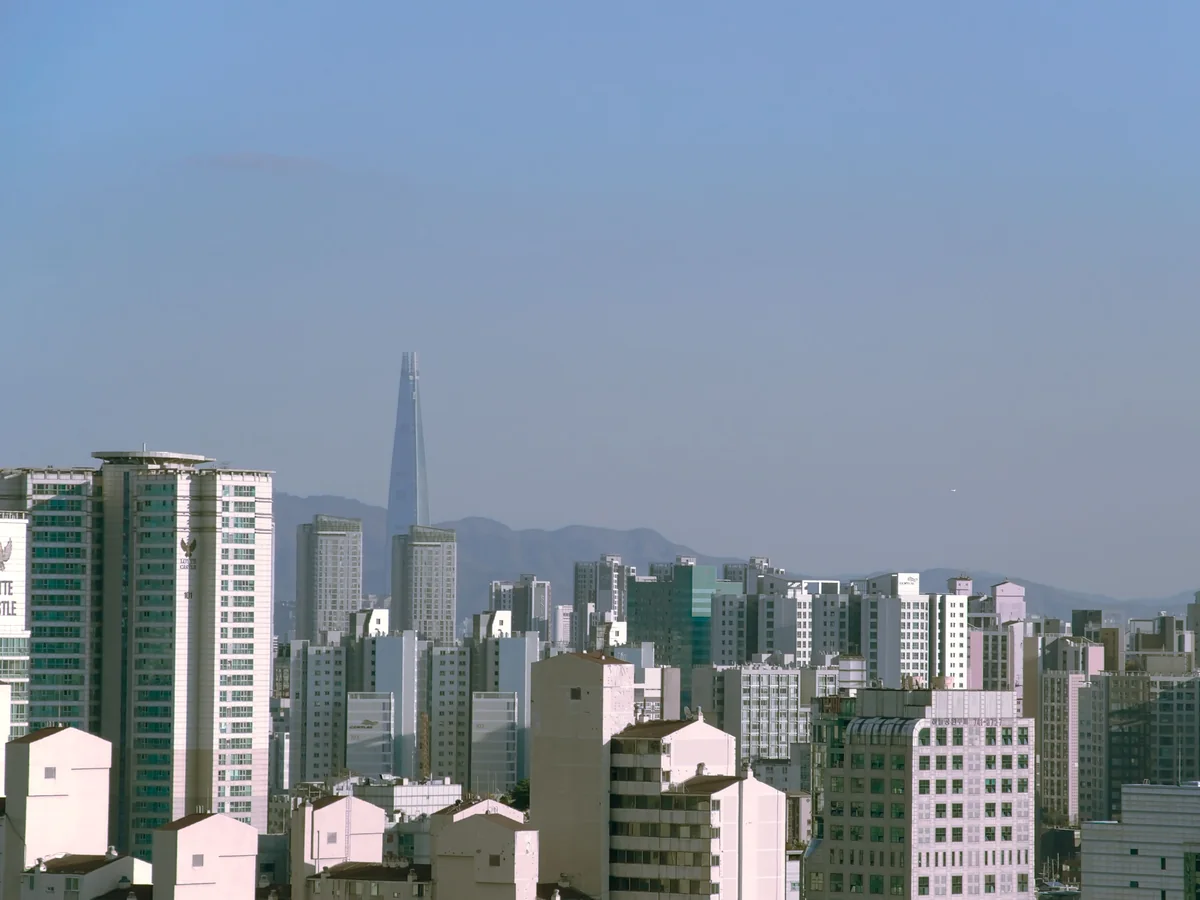 The Seoul skyline with Lotte World Tower rising near Jamsil, the neighbourhood the stadium sits in